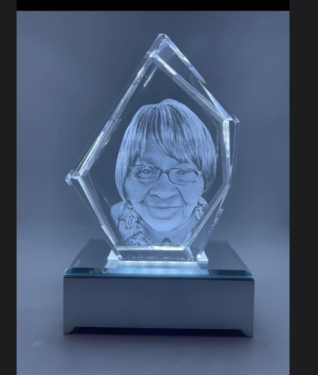 3D Crystal Prestige keepsake with a loved one's photo etched in crystal on a lighted base